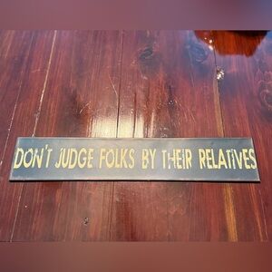 Don’t Judge Folks By Their Relatives Sign